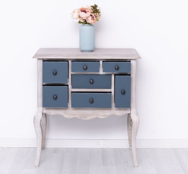 Console with curved legs and 7 multicolored drawers