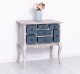 Console with curved legs and 7 multicolored drawers