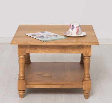 Coffee table with turned legs and a low shelf , top oak